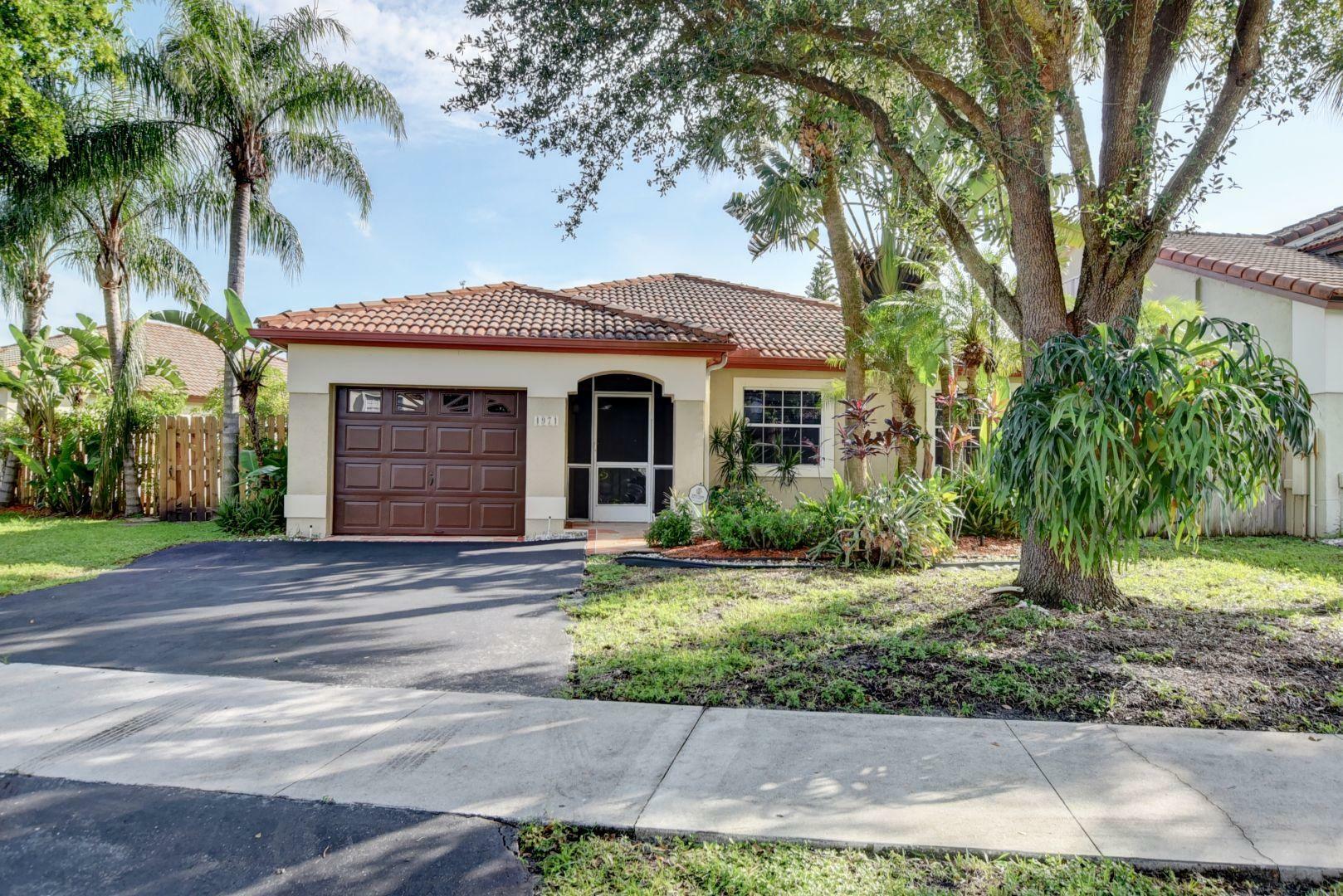 Property Photo:  4971 NW 55th Street  FL 33073 