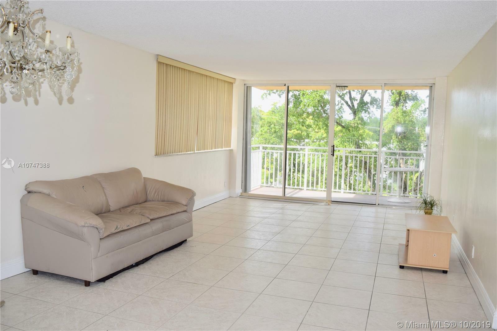 Property Photo:  2450 NE 135th St 312  FL 33181 