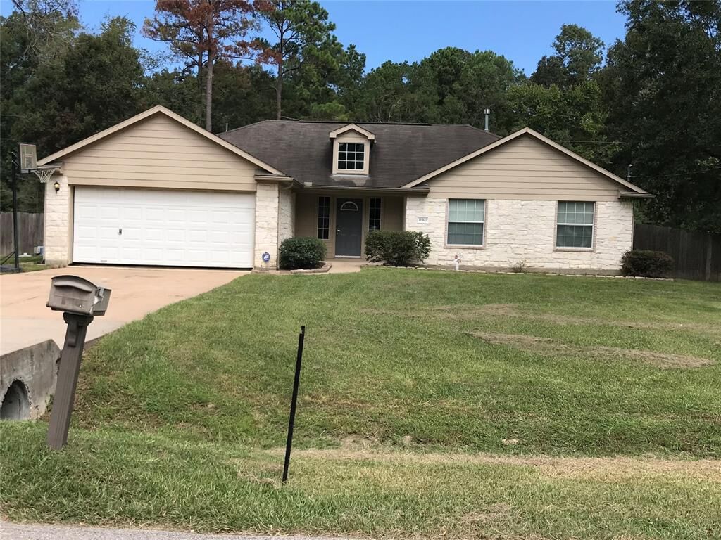 Property Photo: 11502 Walraven Drive TX 77336