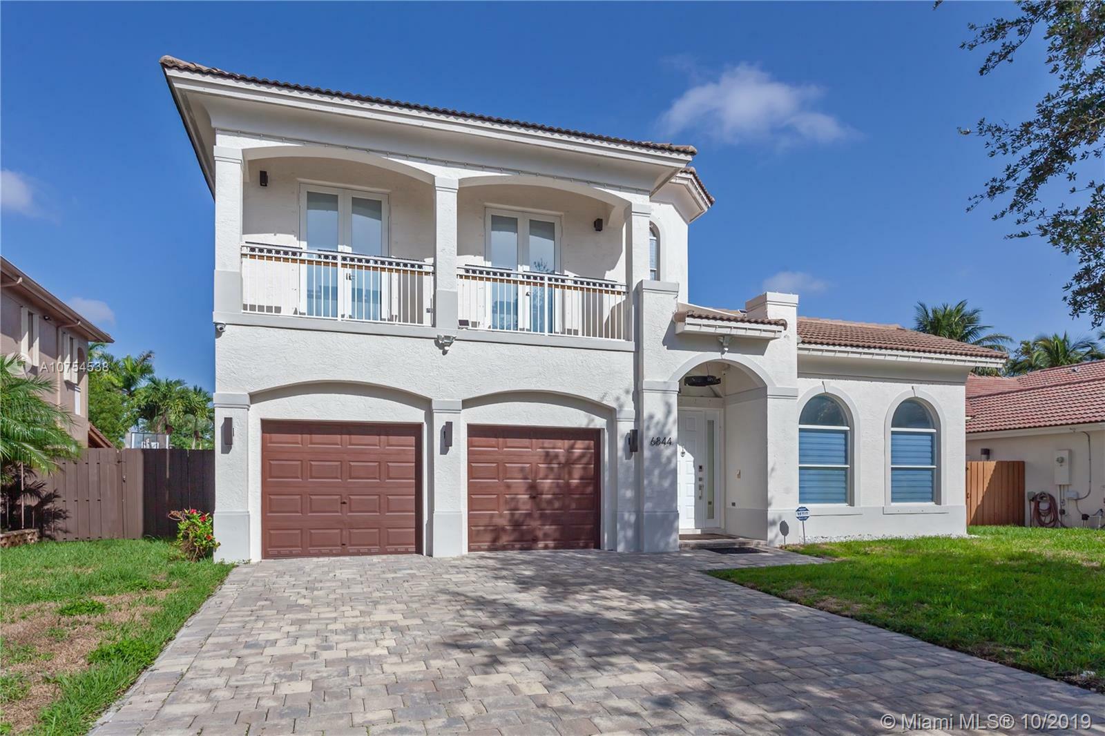 Property Photo: 6844 NW 113th Pl - FL 33178