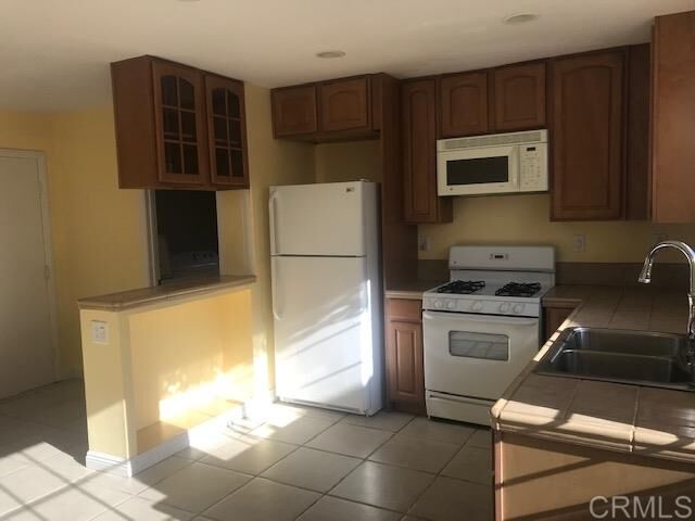 Property Photo:  1401 Ziess  CA 92058 