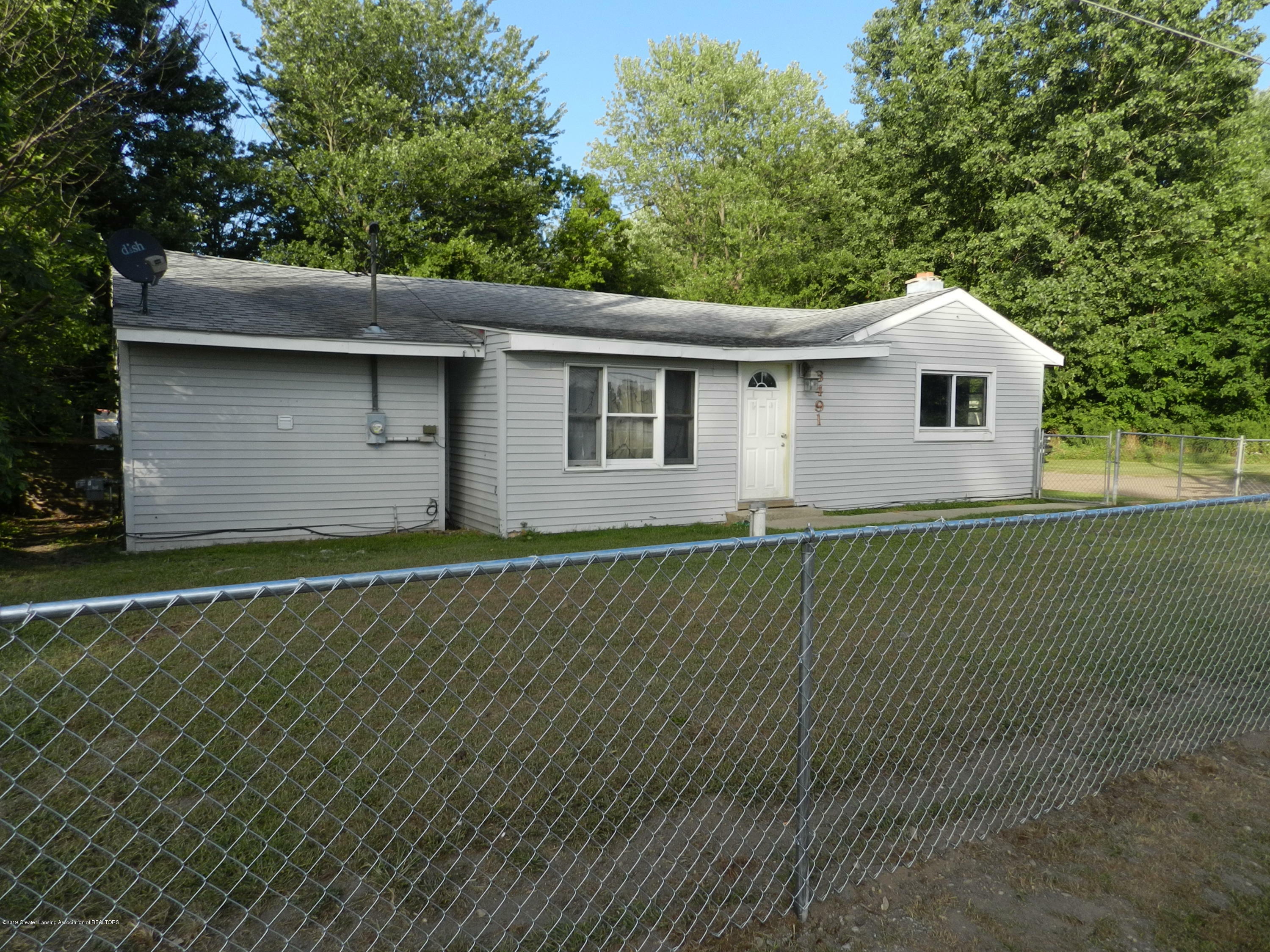 Property Photo:  6491 Park Lake Road  MI 48808 