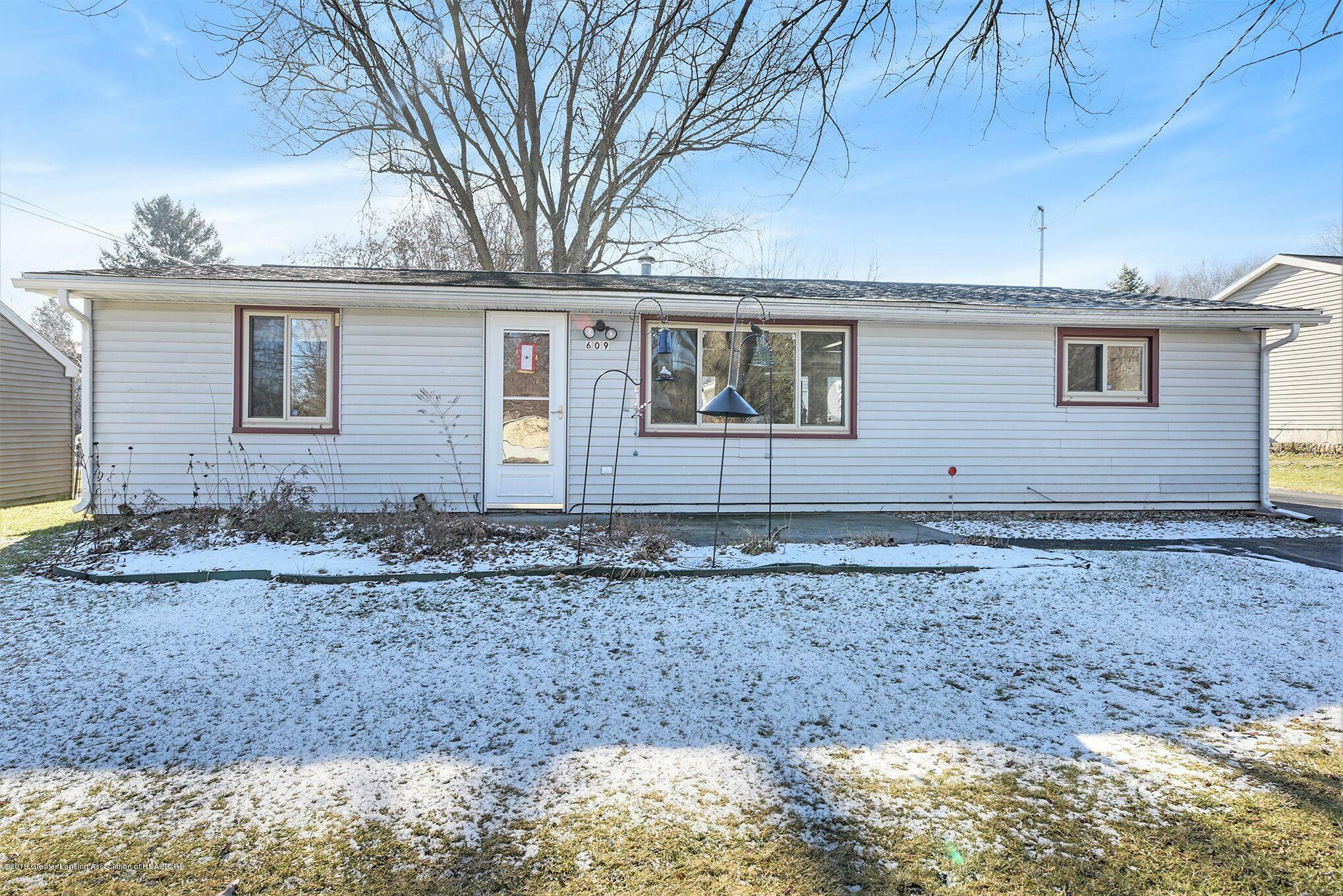 Property Photo:  609 Cedarwood Street  MI 48820 