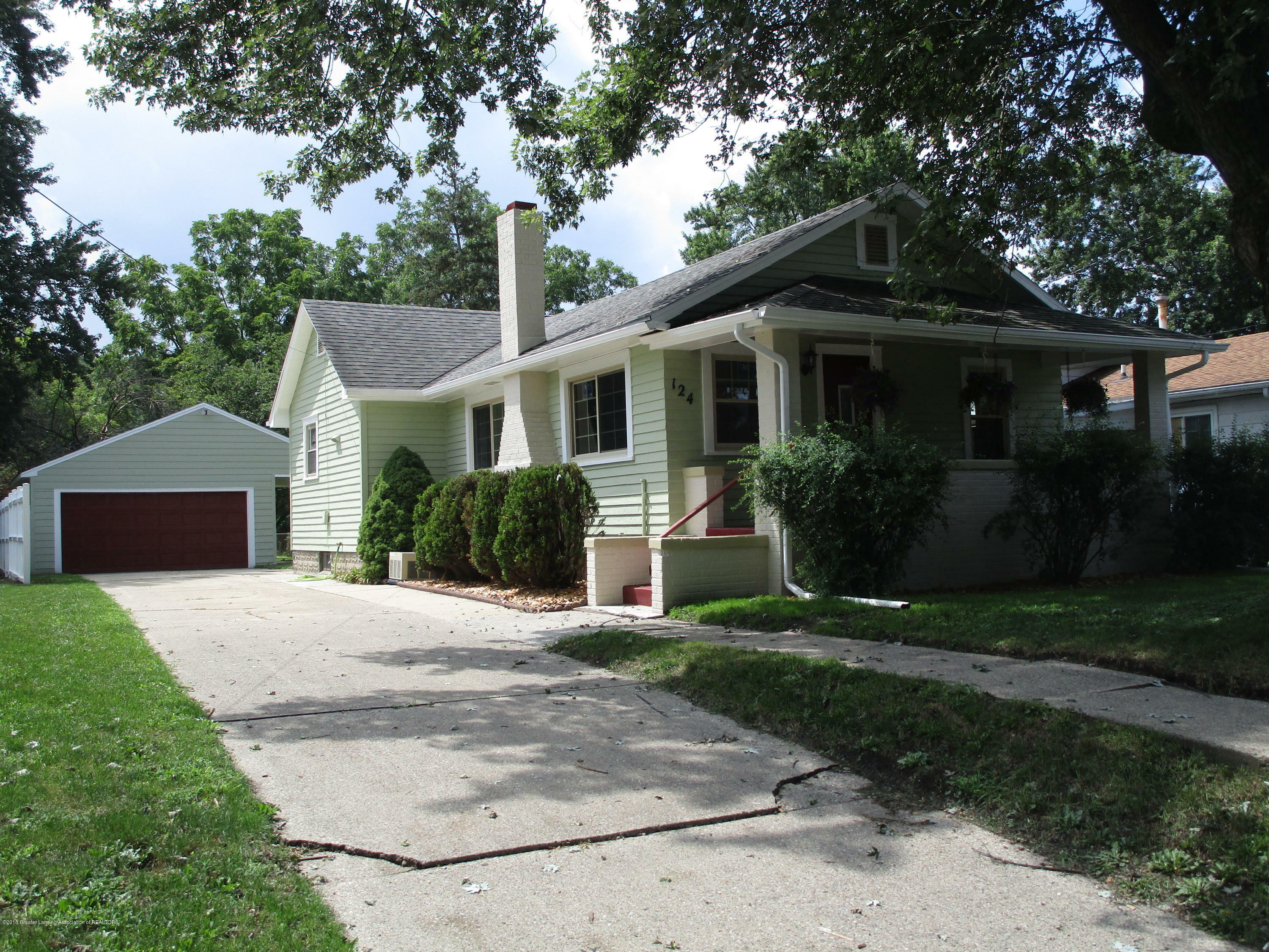 Property Photo:  124 E Rouse Street  MI 48910 