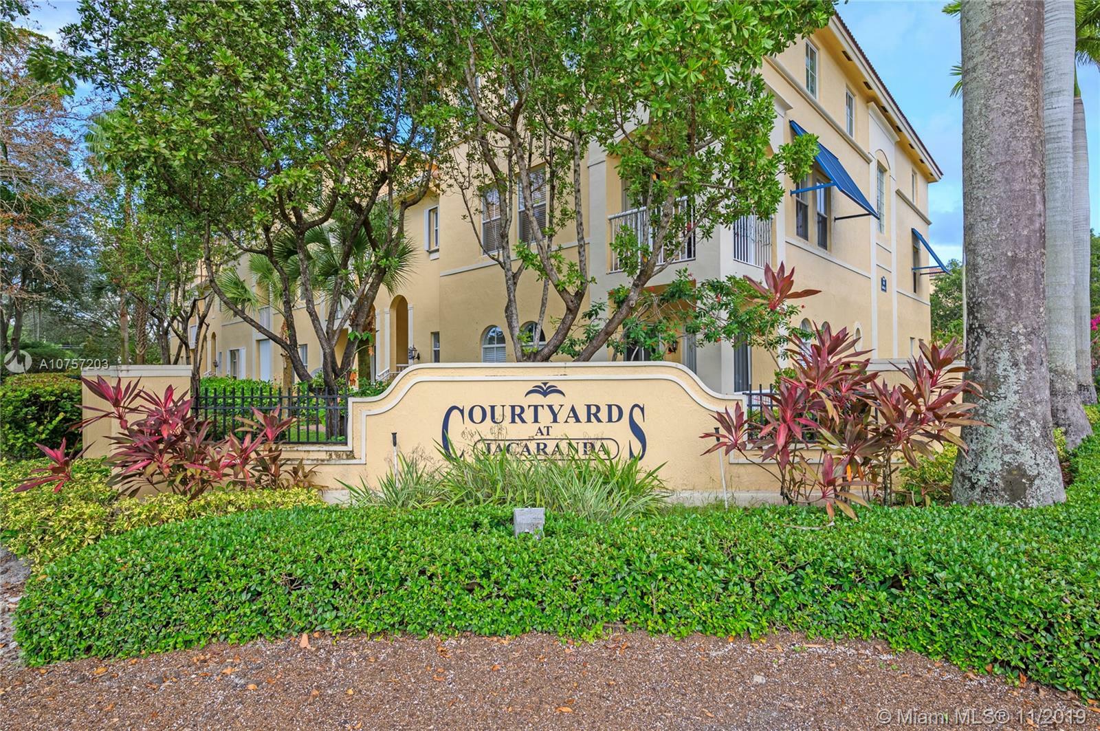 Property Photo:  100 Jacaranda Country Club Dr 103  FL 33324 