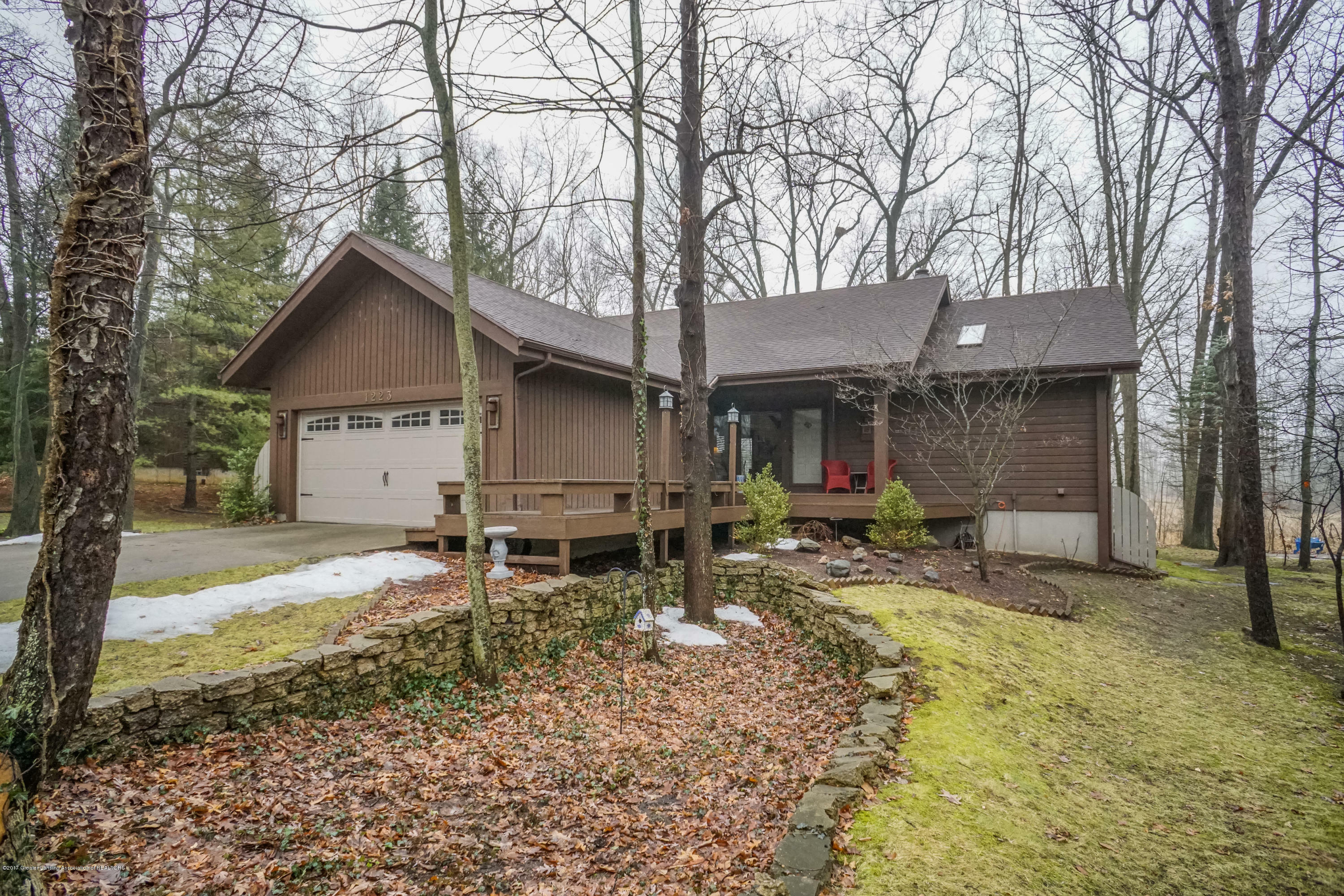 Property Photo:  1223 Woodwind Trail  MI 48840 