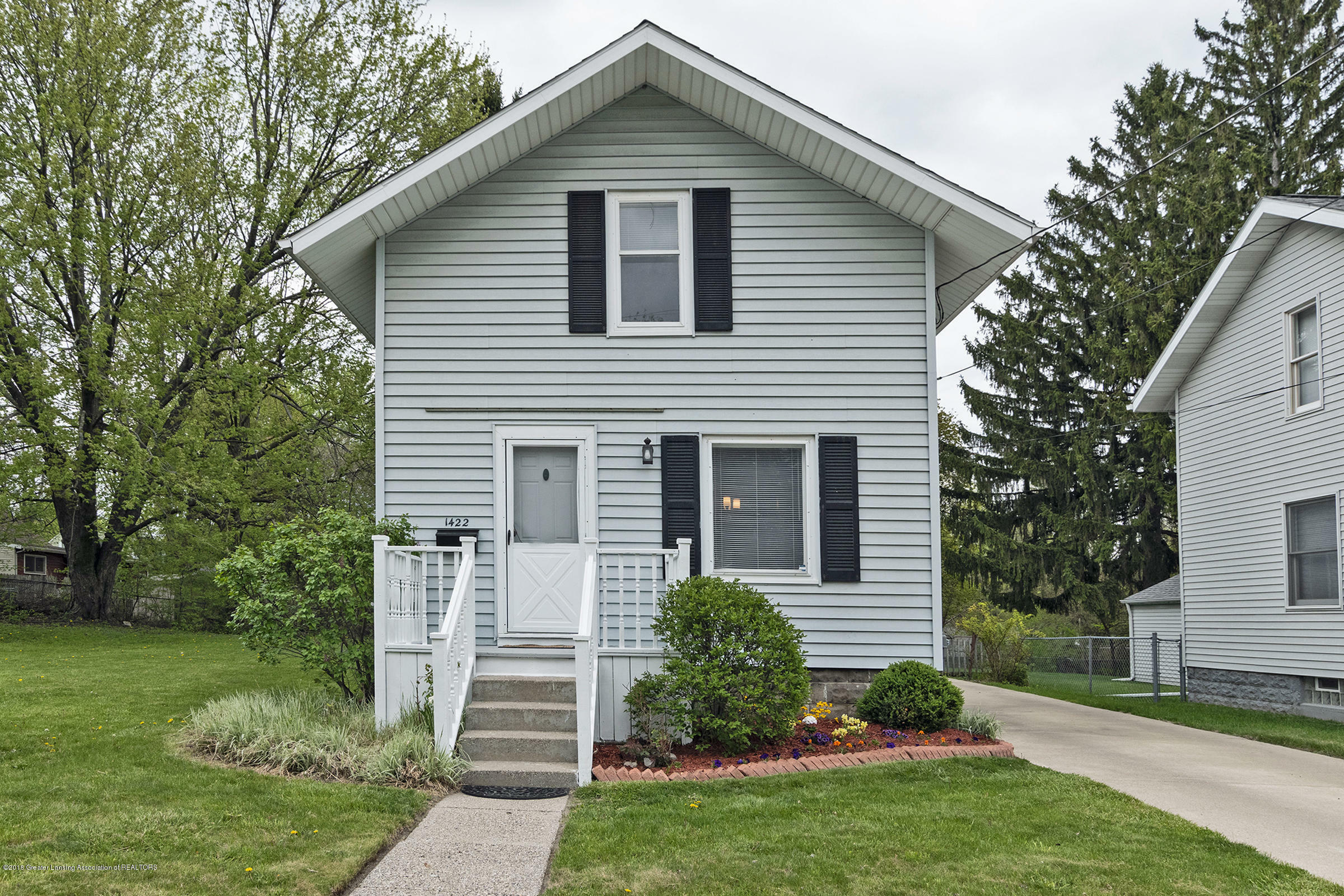 Property Photo:  1422 Redwood Street  MI 48915 