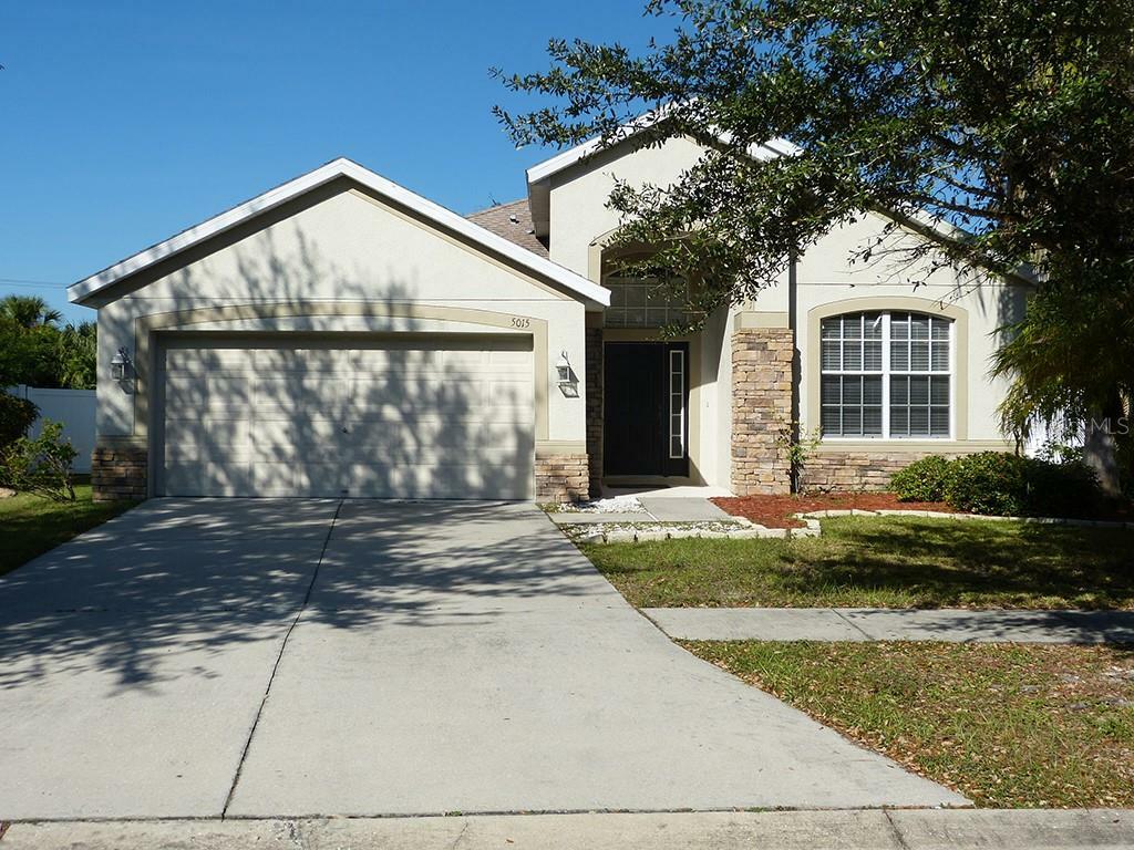 Property Photo: 5015 Clover Mist Drive FL 33572