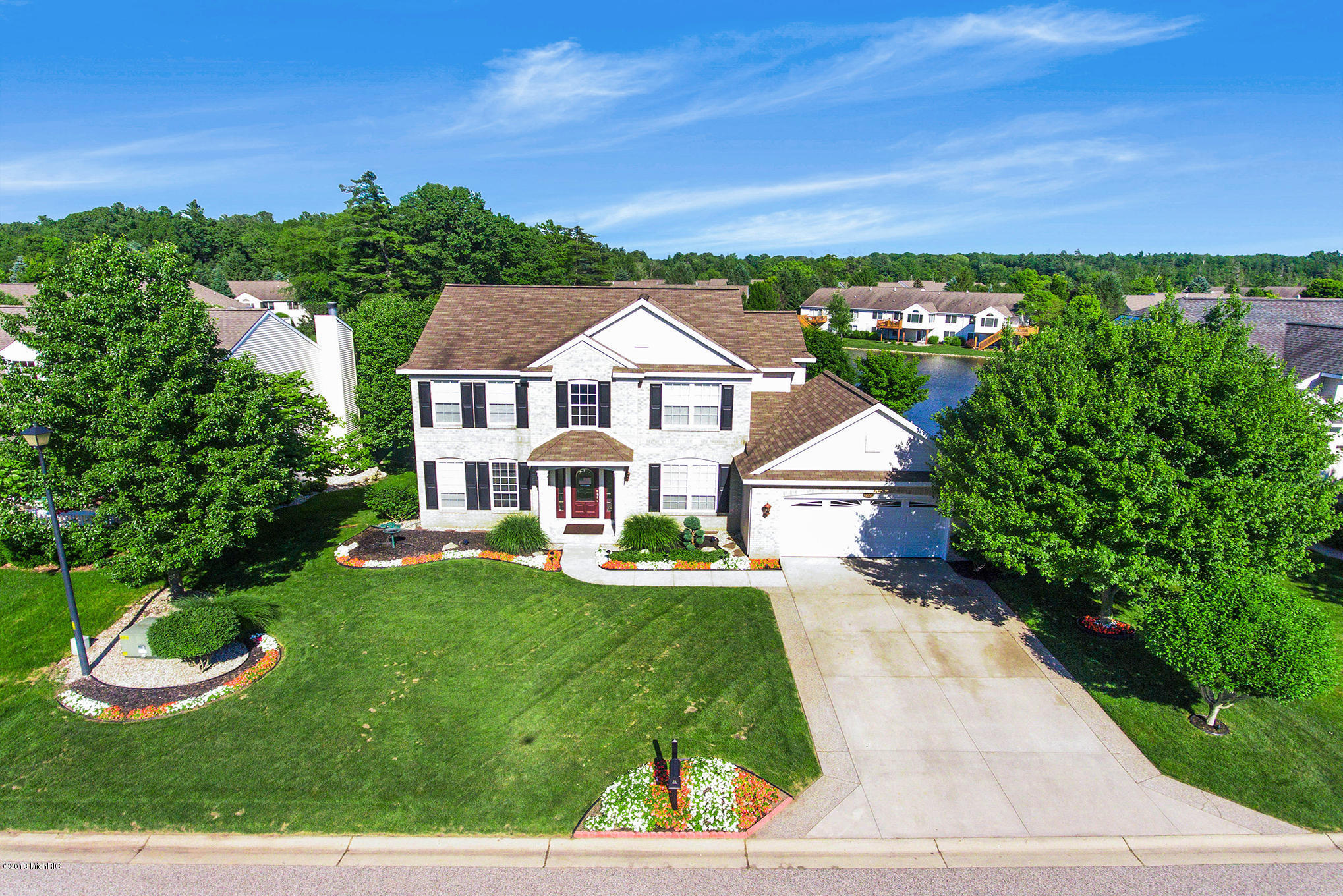 Property Photo:  6858 Windflower Way  MI 49444 