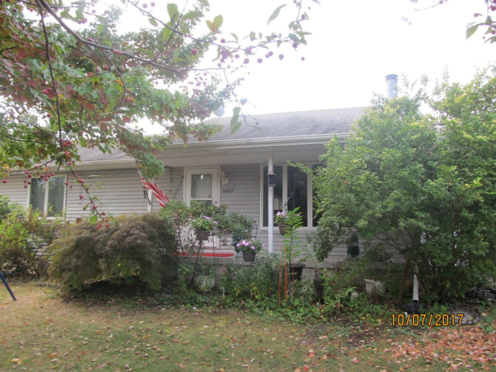 Property Photo:  6497 College Avenue SE  MI 49548 