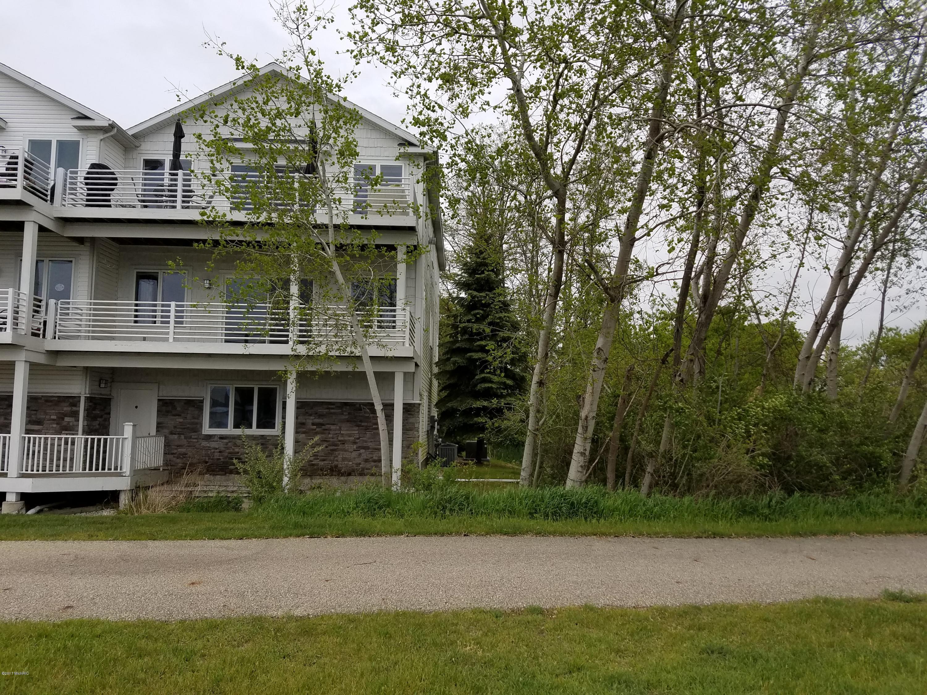Property Photo: 8680 Ellenwood Estates Drive MI 49437