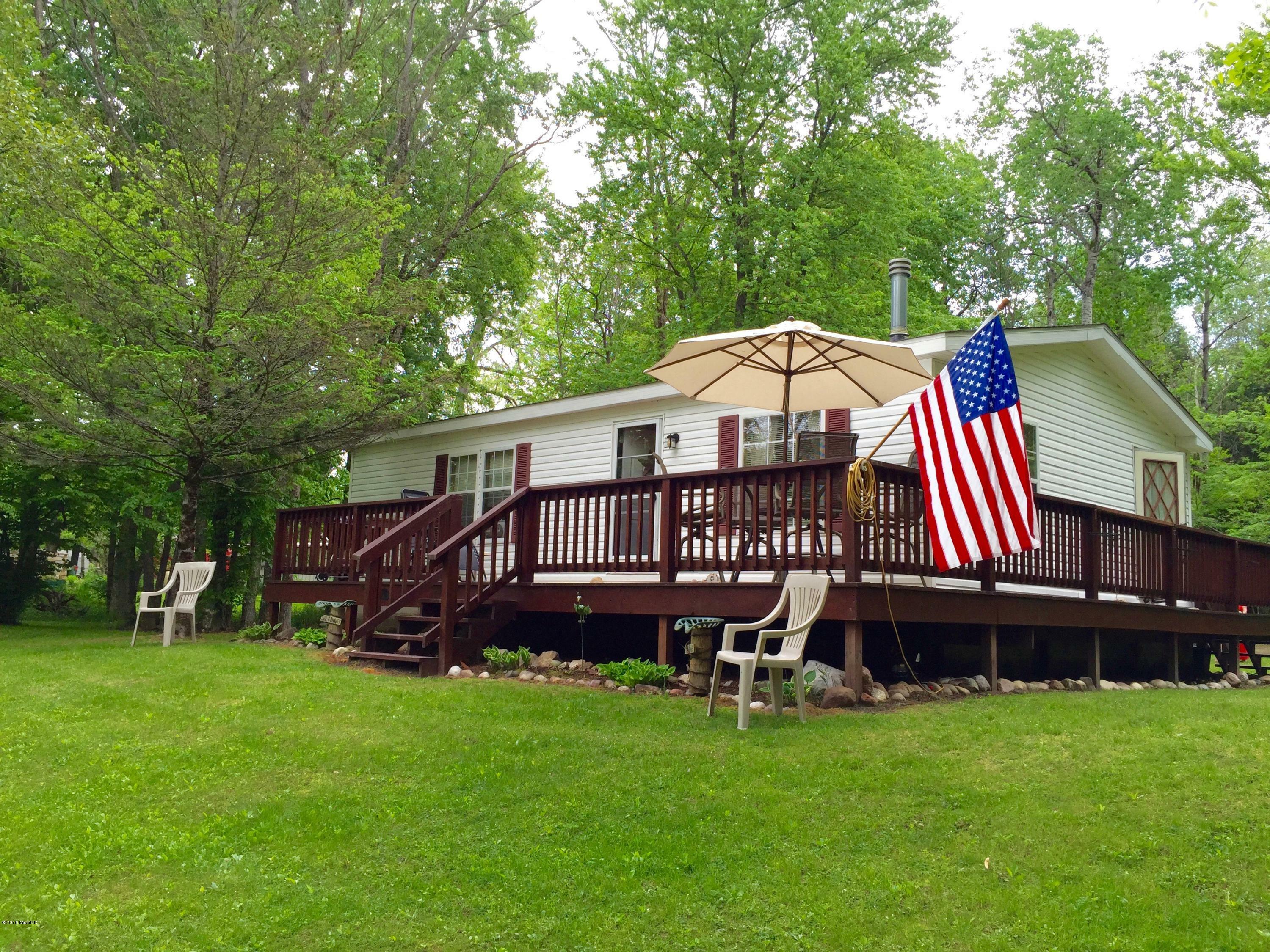 Property Photo:  5768 Logging Trail Drive  MI 49679 