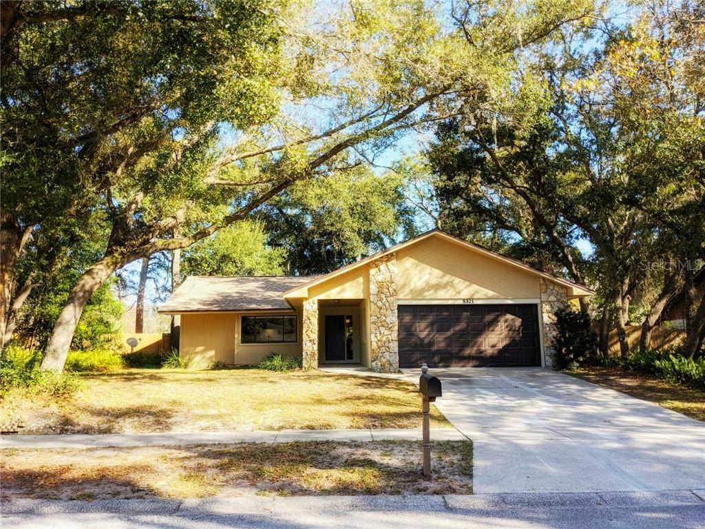 Property Photo: 8321 Camphor Tree Drive 1 FL 32810