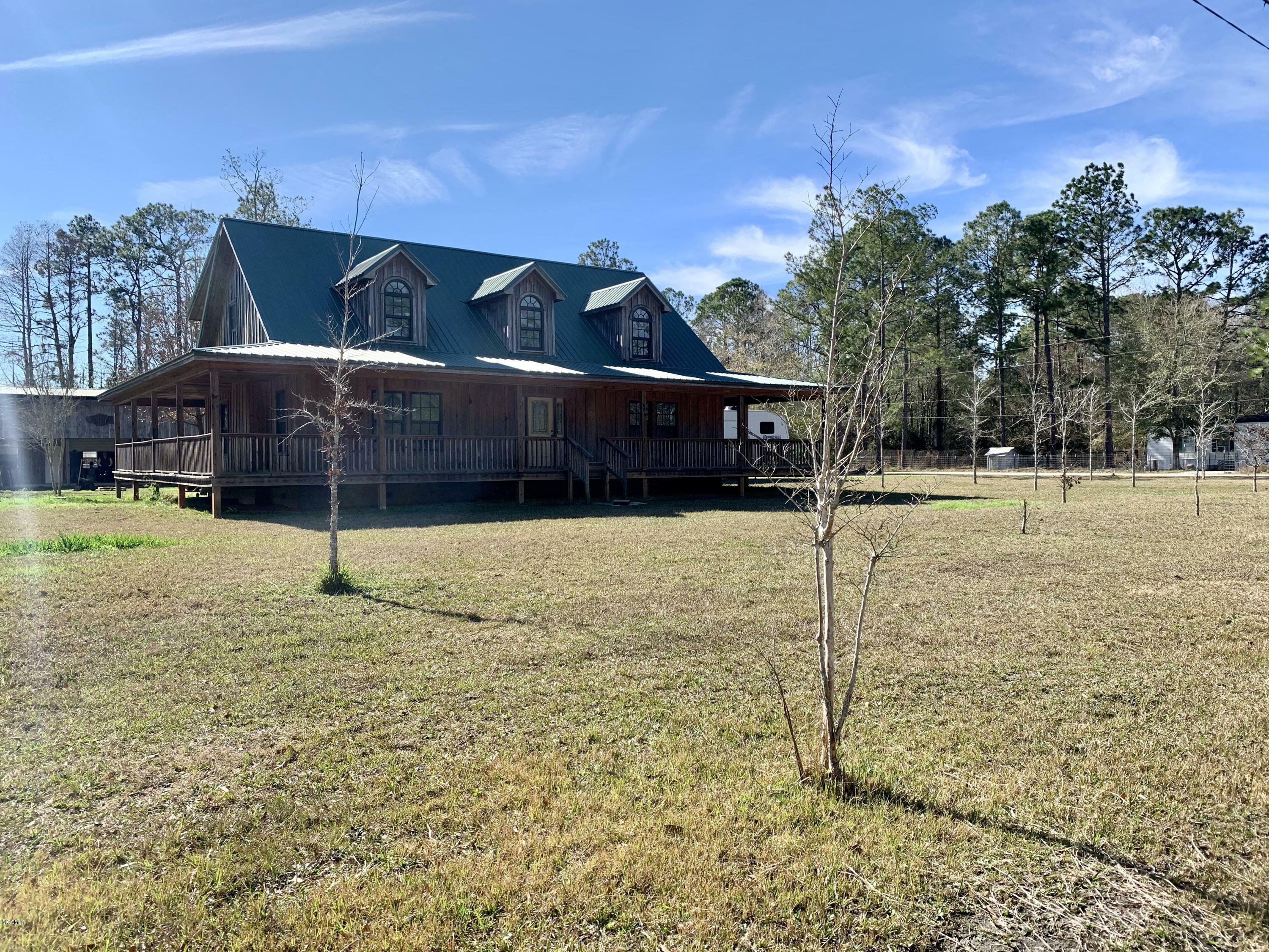 Property Photo:  9829 Bragg Road  MS 39562 
