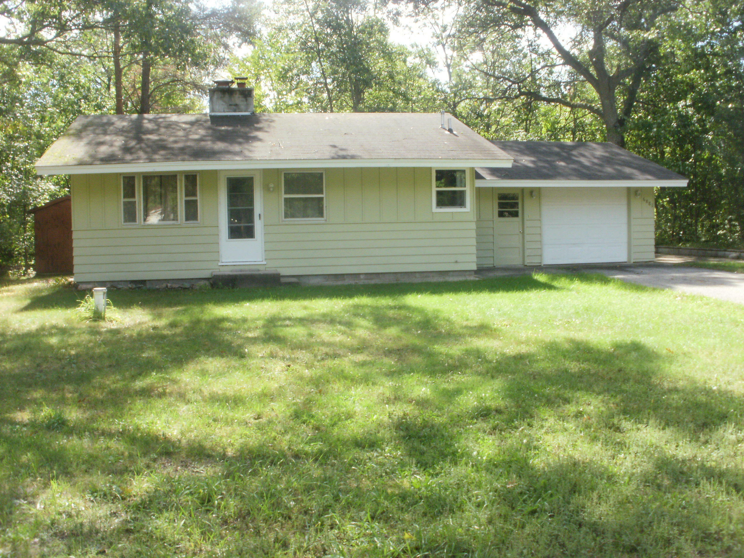 Property Photo:  6881 Bosserman Court  MI 49749 