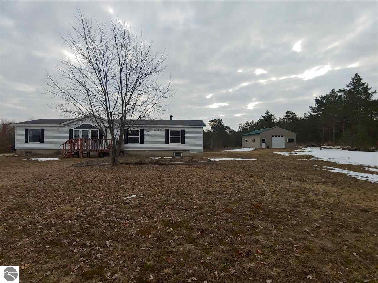 Property Photo:  6246 Lanning Road  MI 49663 