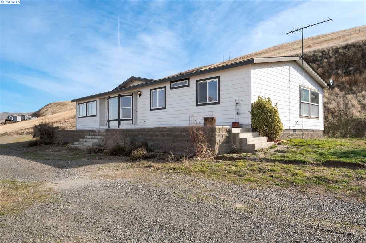 Property Photo: 170101 W 215 Pr SW WA 99350