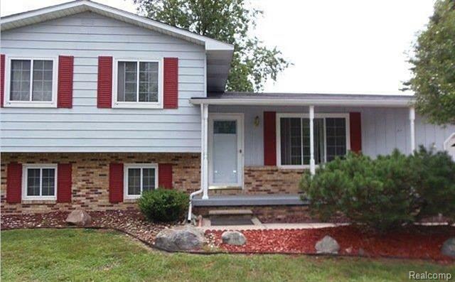 Property Photo:  1687 Wild Cherry Lane  MI 48446 