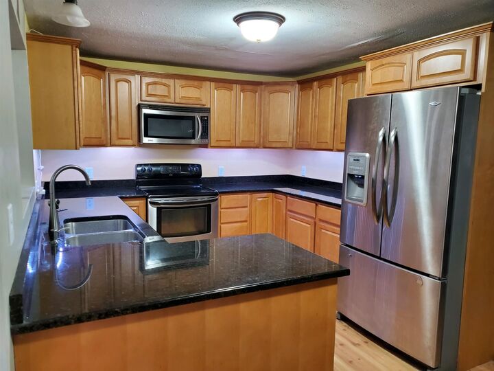 Property Photo: 49 Grey Rock Road NH 03110