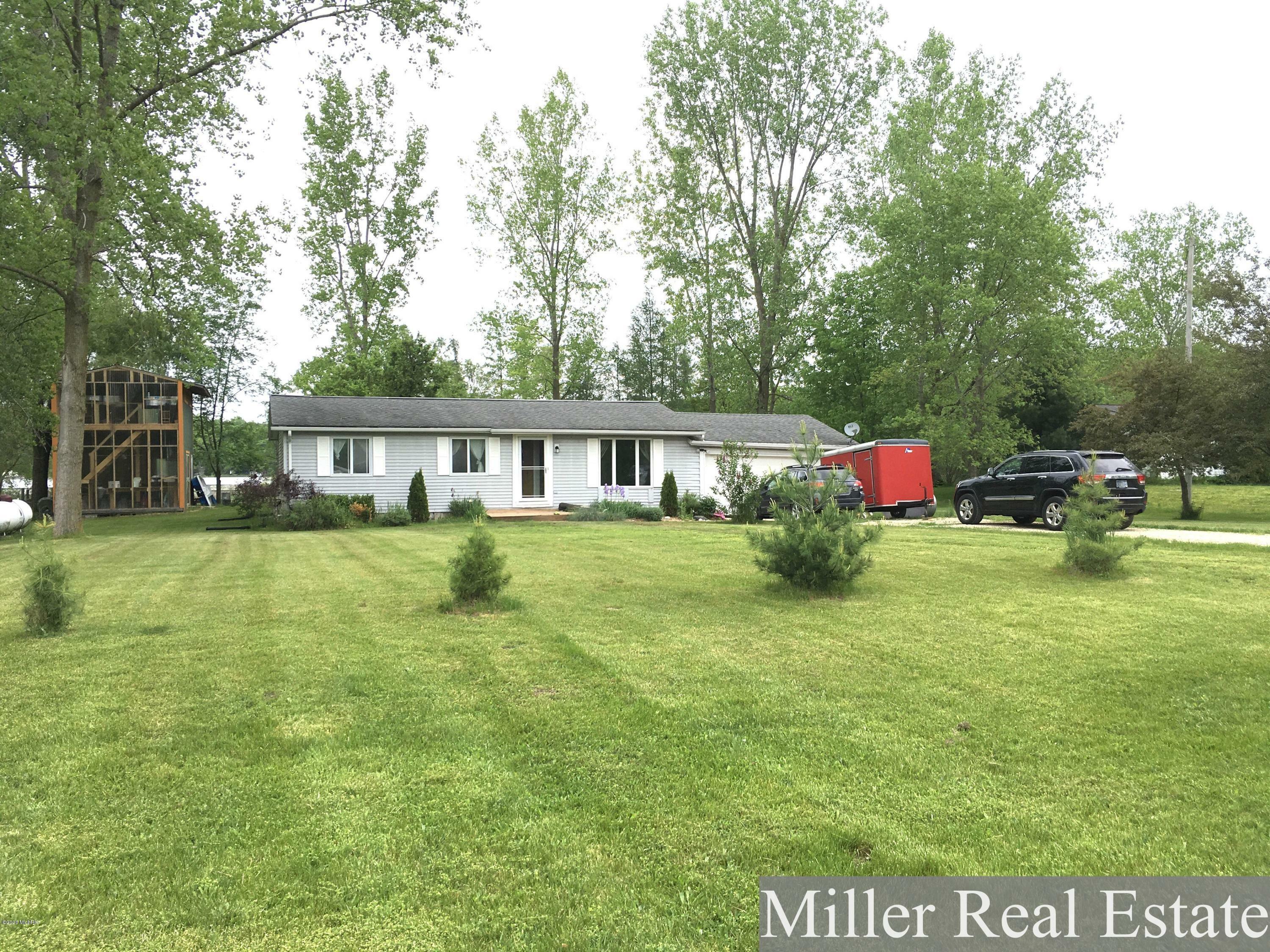 Property Photo:  5828 Osceola Drive  MI 49046 