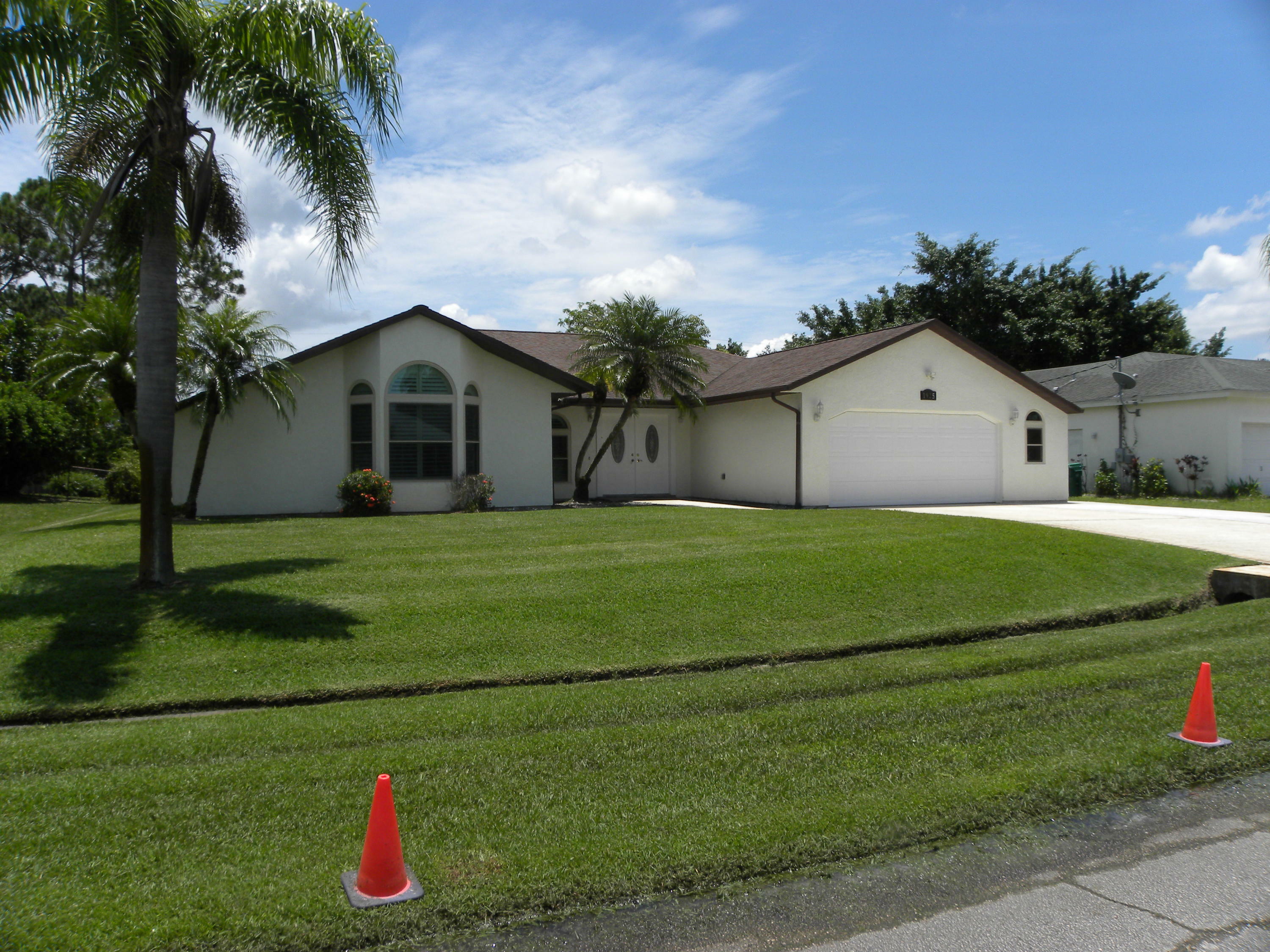 Property Photo:  1925 SE Cheltenham Street  FL 34983 