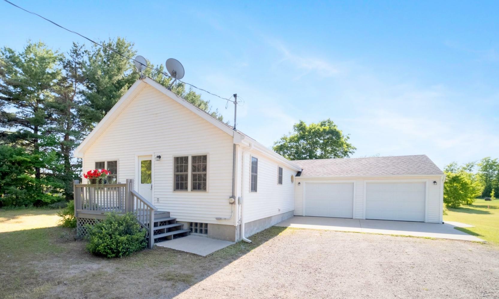 Property Photo:  8236 Miller Road  MI 49706 