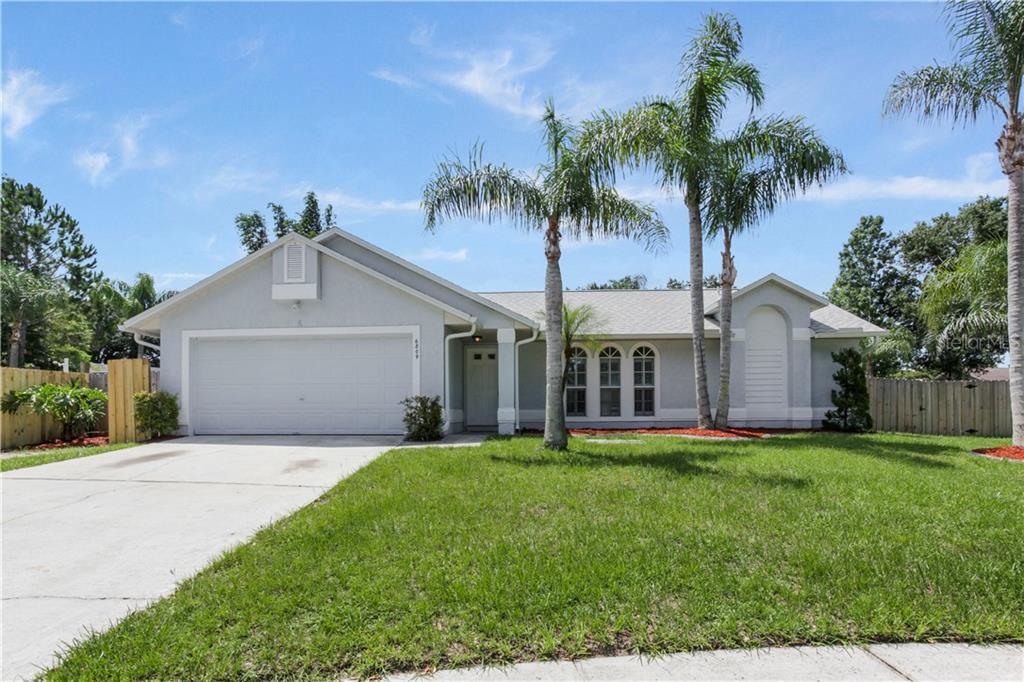 Property Photo: 6809 Woodgrain Court FL 34761
