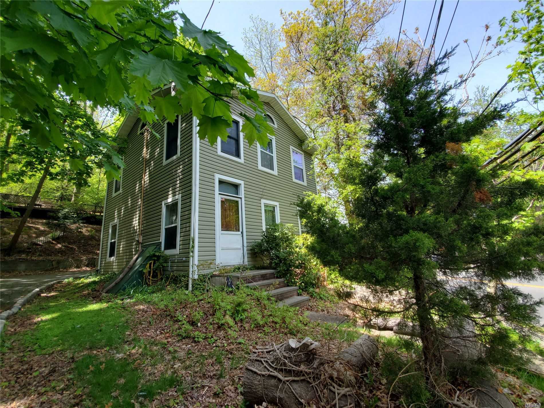 Property Photo:  650 Main Street  NY 11777 