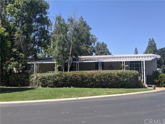 Property Photo: 24001 Muirlands Blvd 62 CA 92630