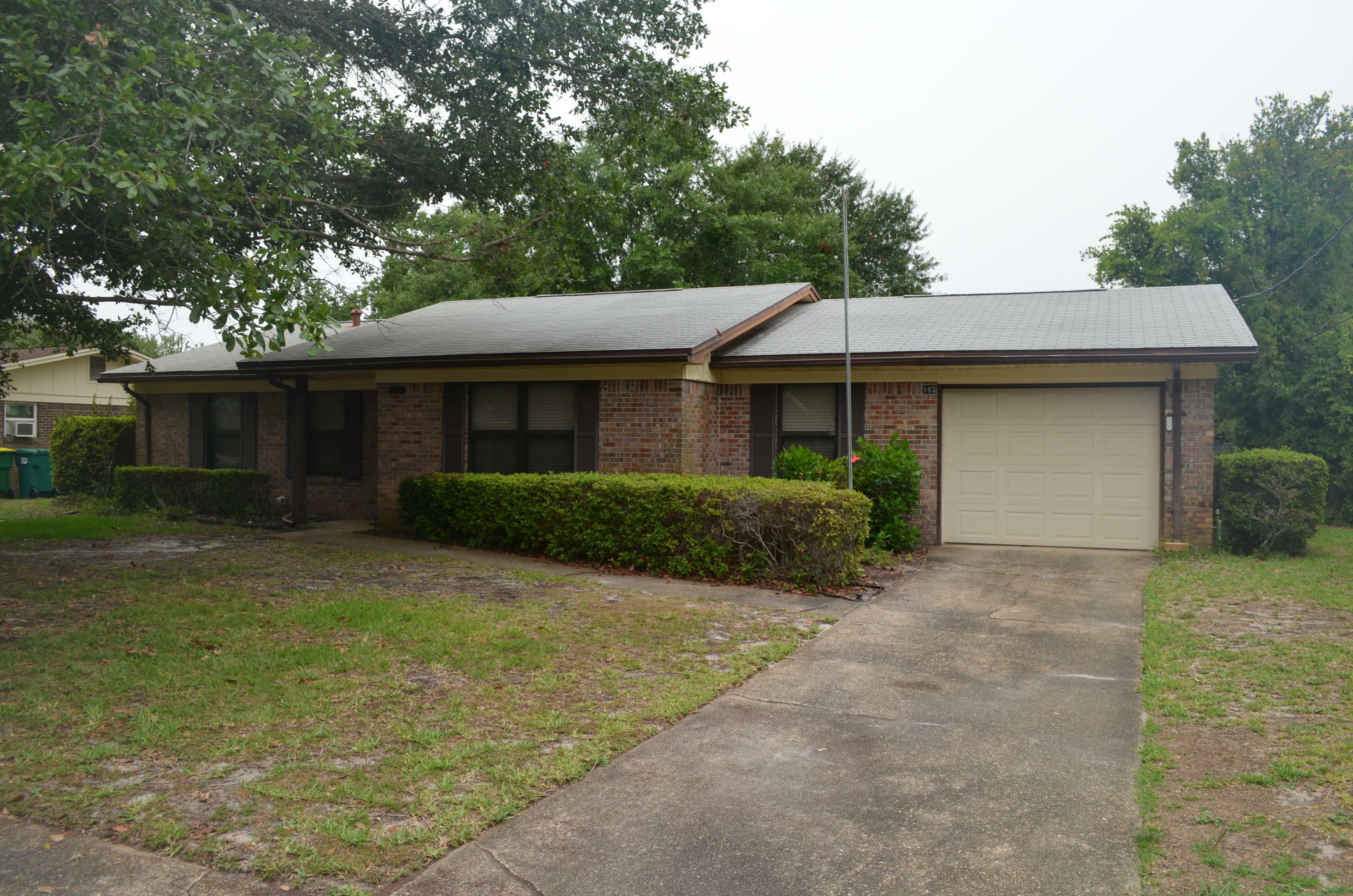 Property Photo:  183 Brewer Circle  FL 32569 