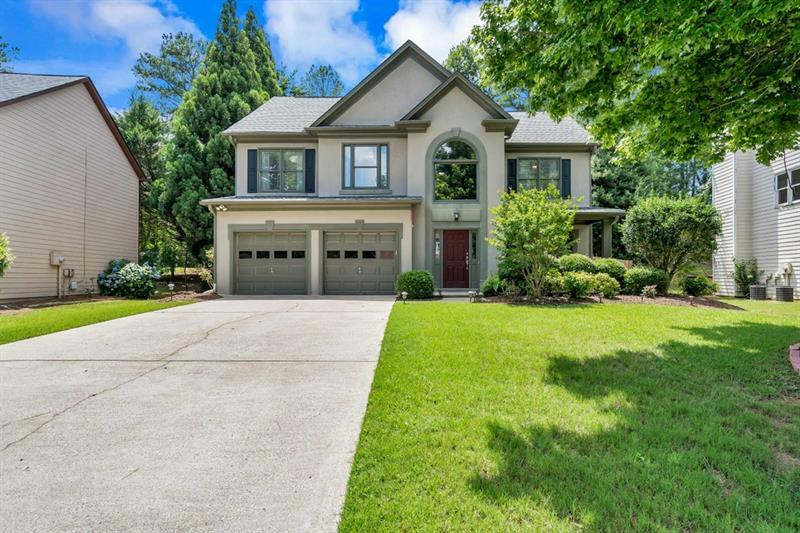 Property Photo:  750 Sheridan Ridge Court  GA 30022 