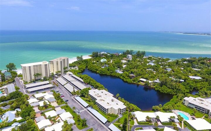 Property Photo:  101 Whispering Sands Drive 207  FL 34242 