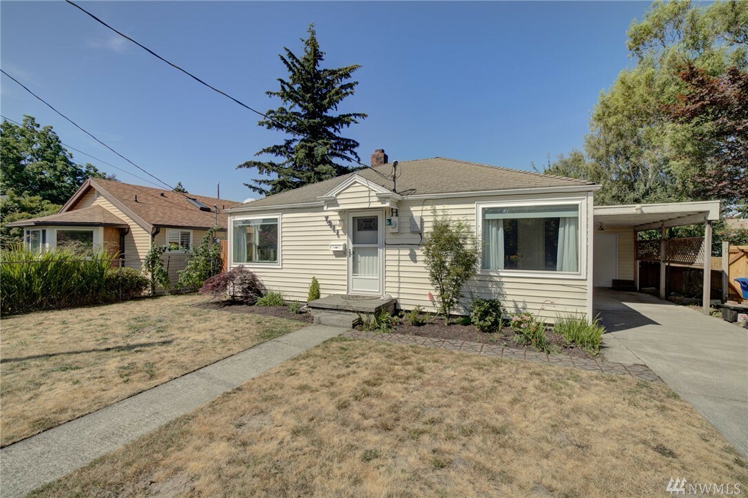 Property Photo:  7911 39th Ave SW  WA 98136 