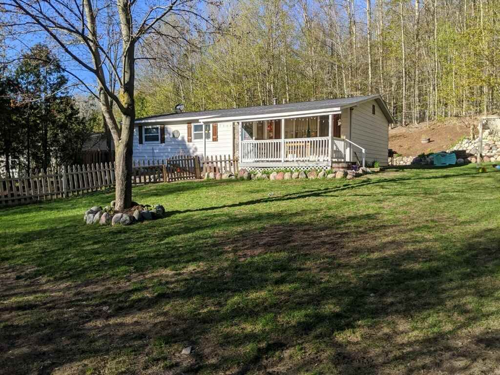 Property Photo:  1449 Pleasant  MI 49712 