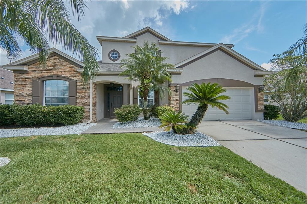 Property Photo: 2381 The Oaks Boulevard FL 34746