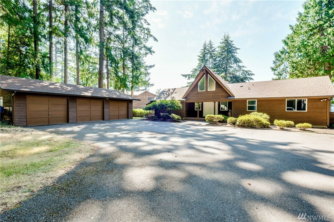 Property Photo:  3828 Forest Beach Dr NW  WA 98335 