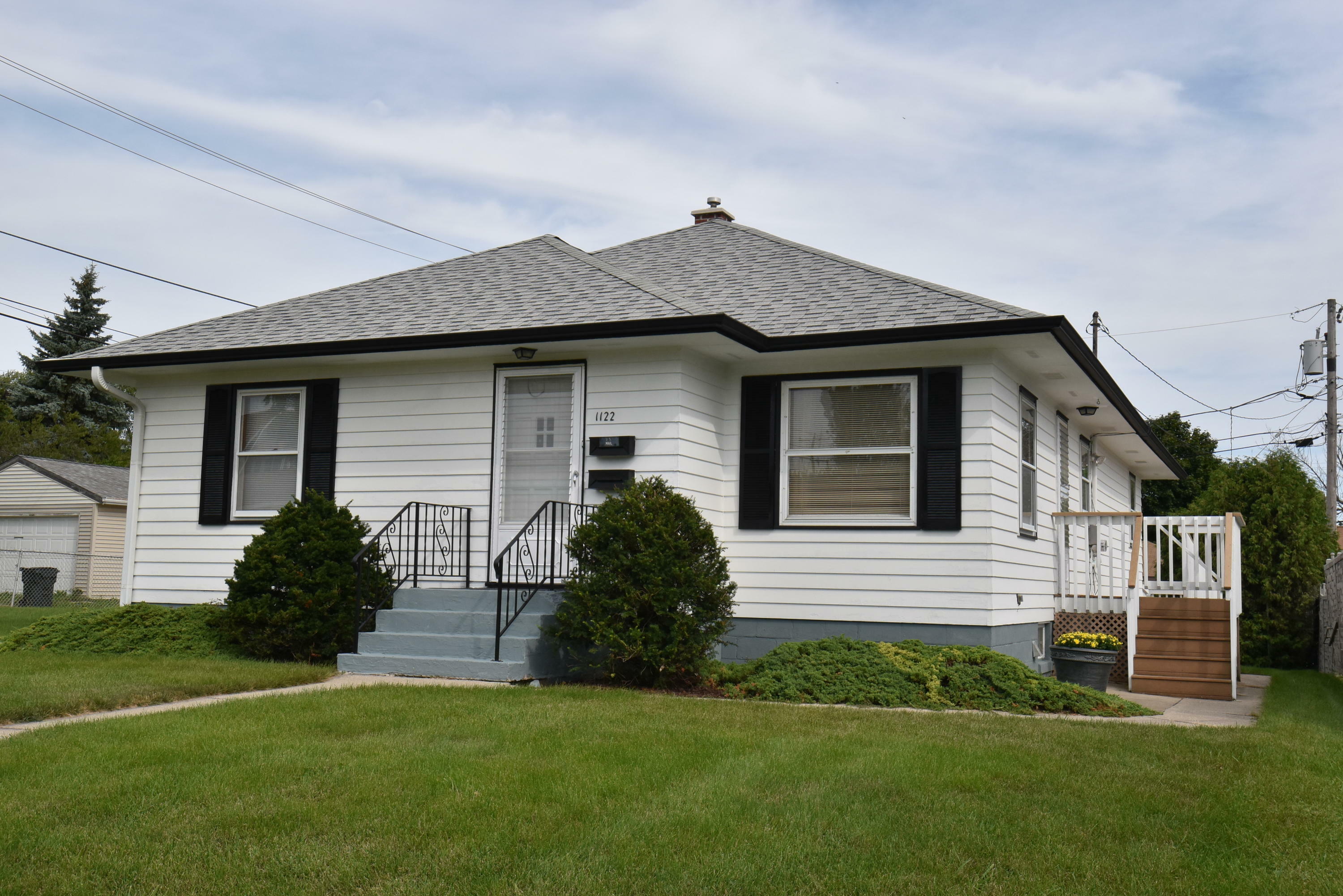 Property Photo:  1122 Menomonee Ave  WI 53172 