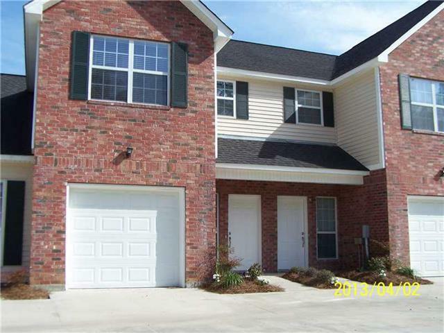 Property Photo: 104 Covington Meadows Circle H LA 70435