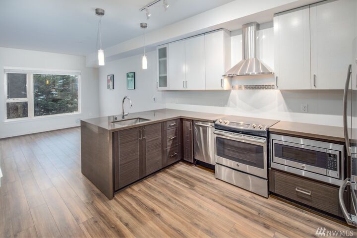 Property Photo:  1760 NW 56th St 213  WA 98107 