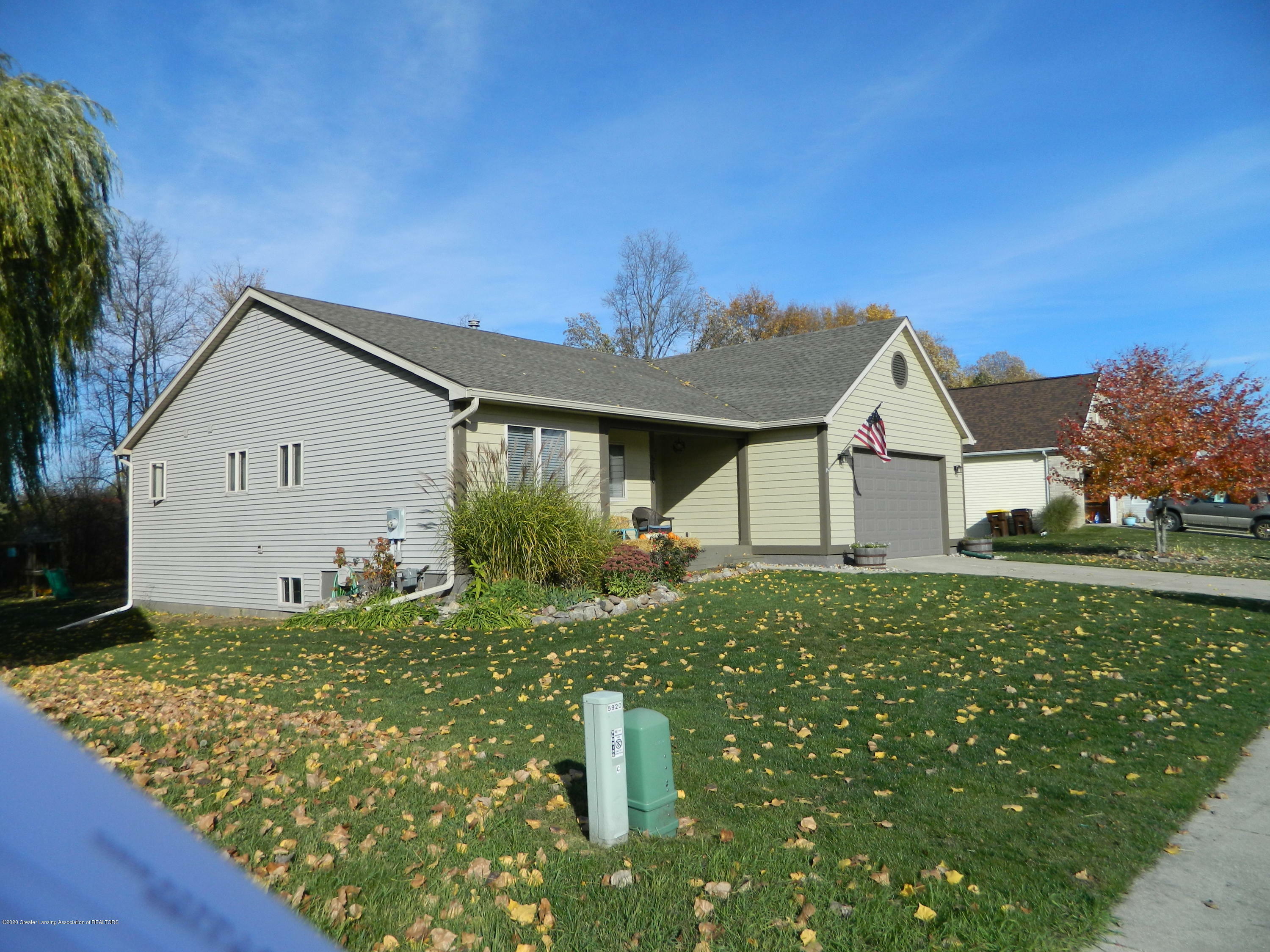 Property Photo:  5910 Cartago Drive  MI 48911 