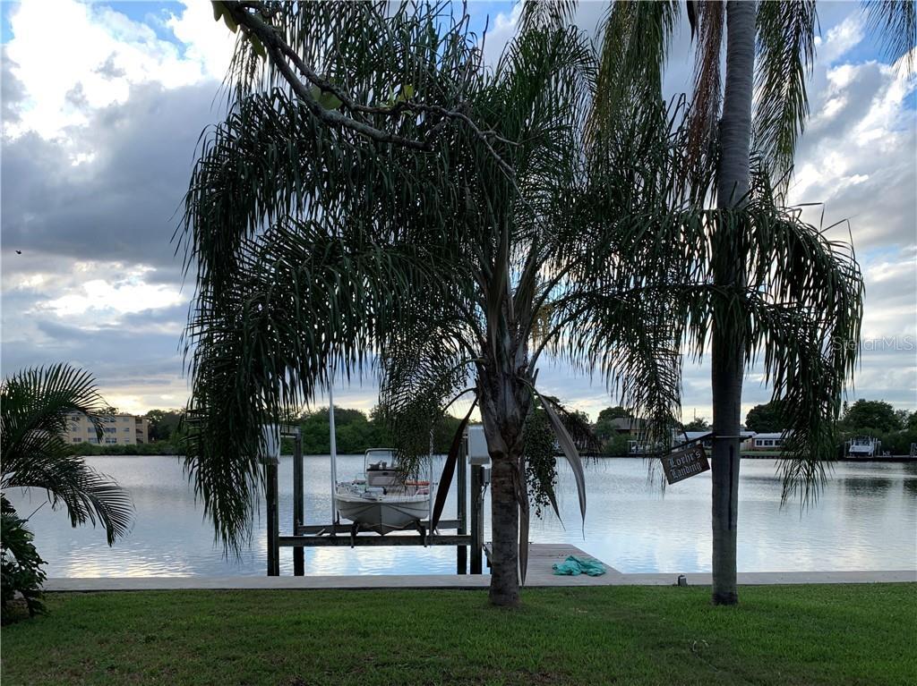 Property Photo:  8744 Sunlit Cove Drive NE  FL 33702 