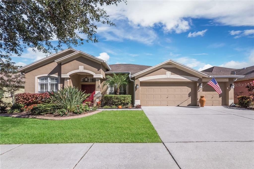 Property Photo: 7314 Carrington Oaks Lane FL 33572