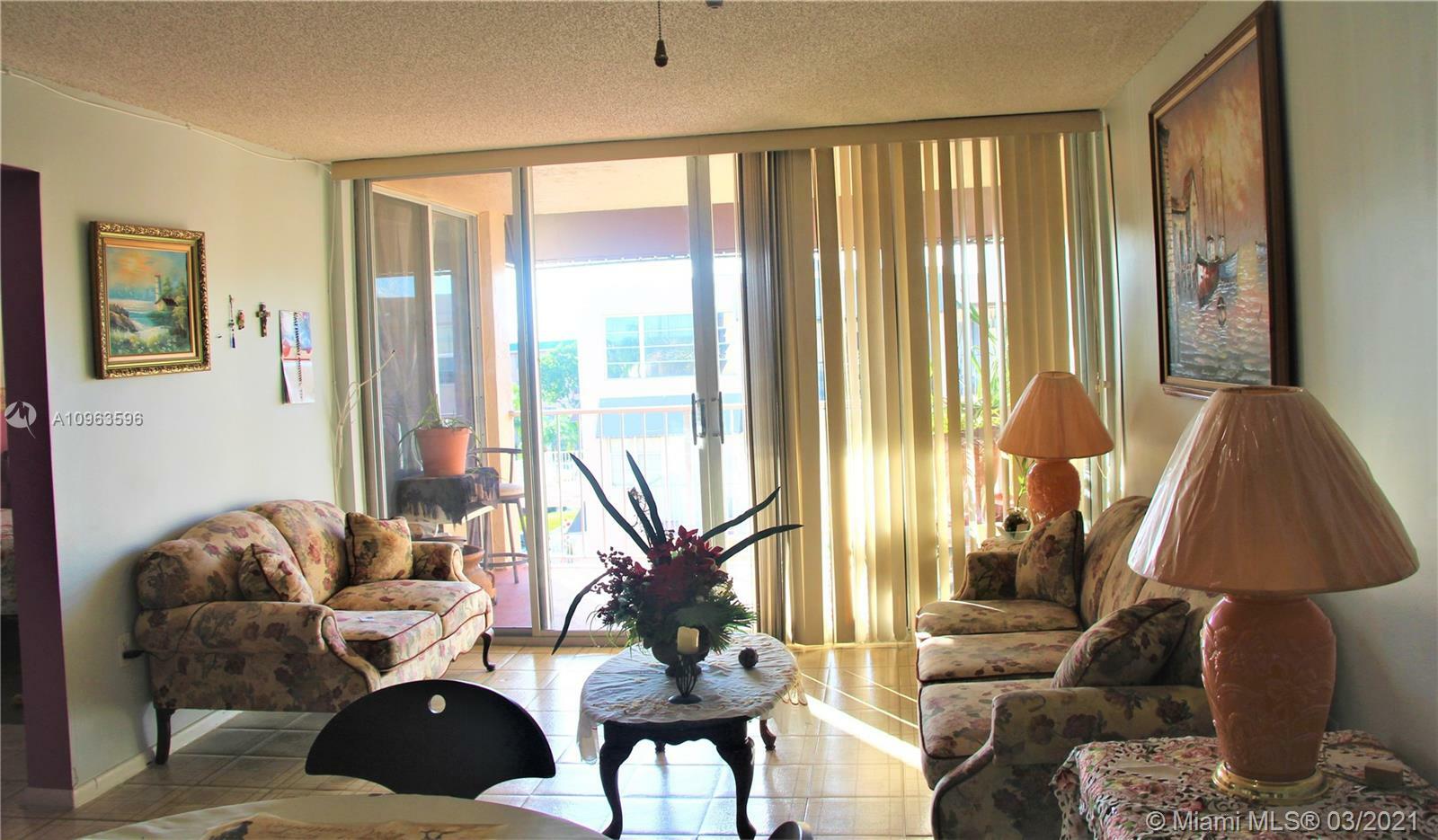 Property Photo:  10700 SW 108th Ave C409  FL 33176 