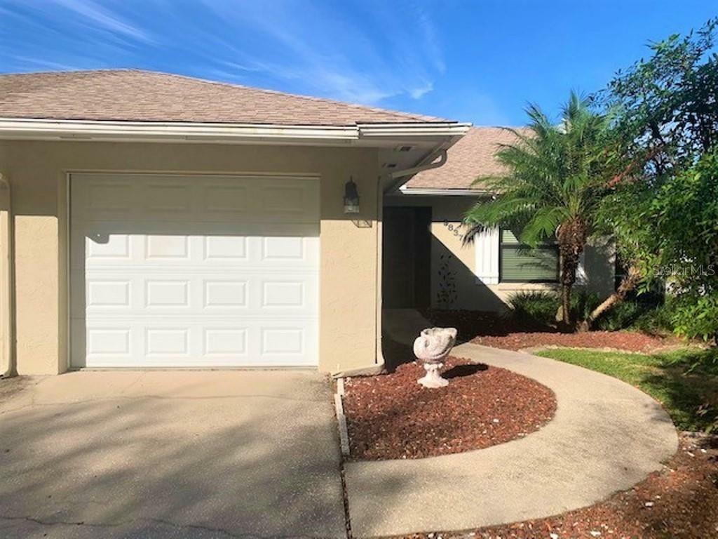 Property Photo:  9837 Carmel Park Drive  FL 32817 