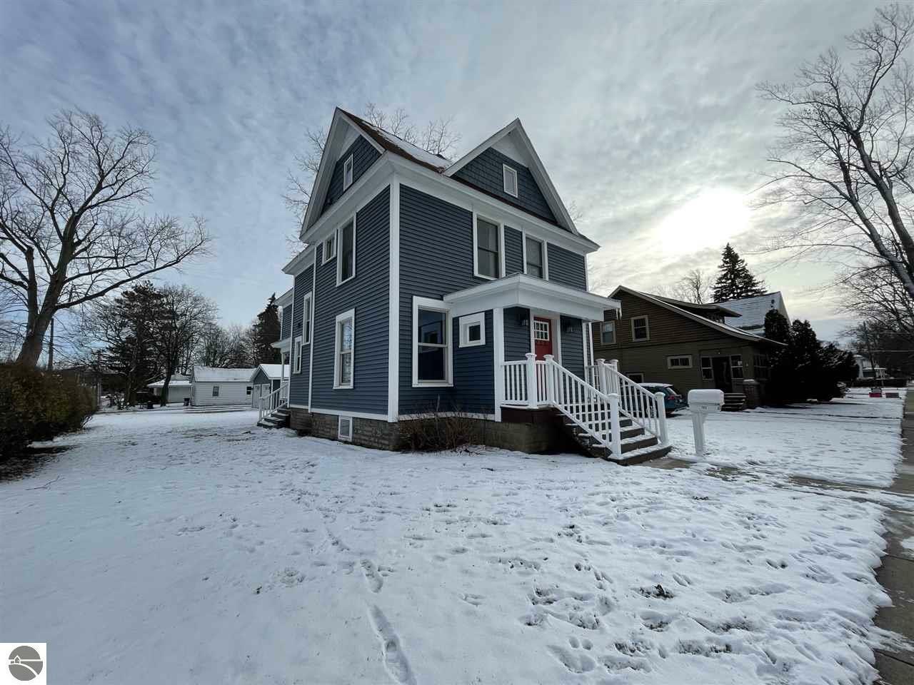 Property Photo:  203 S Kinney Avenue  MI 48858 