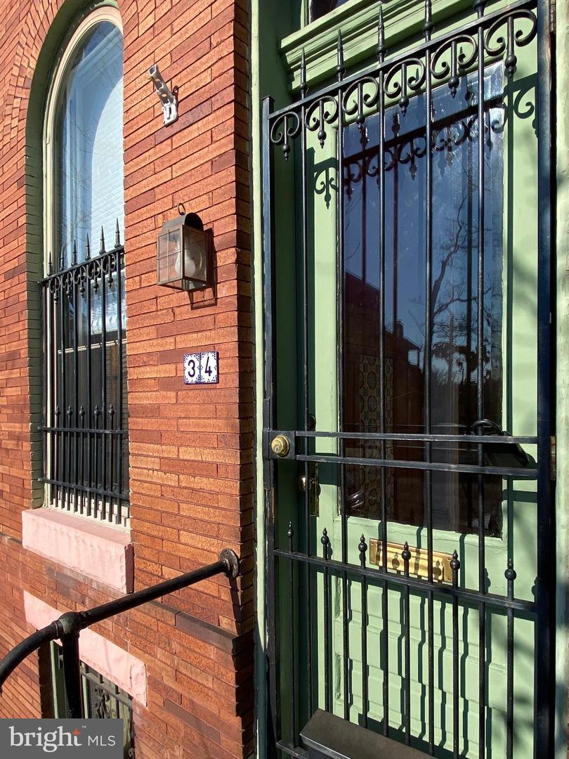 Property Photo: 34 E 27th Street MD 21218