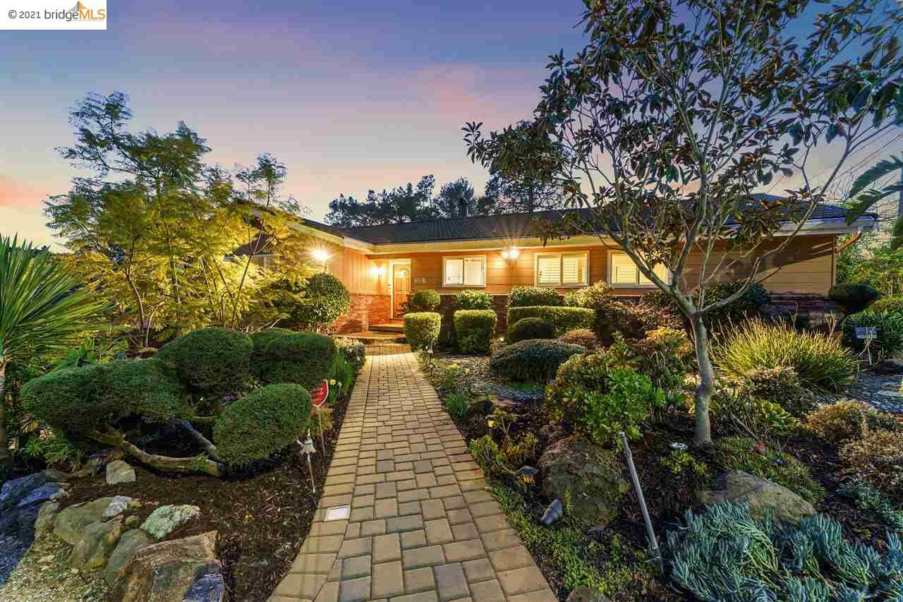 Property Photo:  11001 Lochard St  CA 94605 