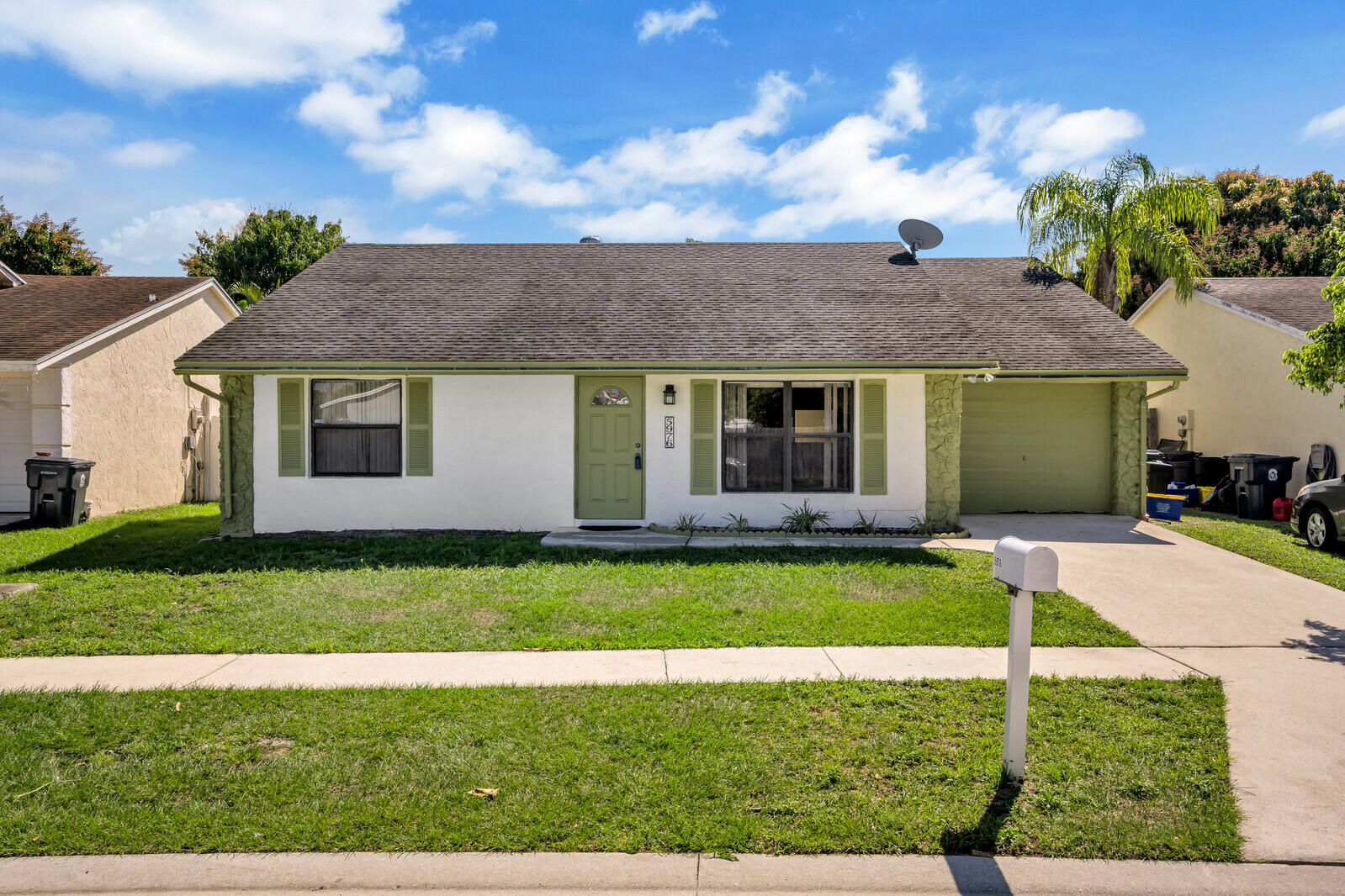 Property Photo: 5976 Corson Place FL 33463