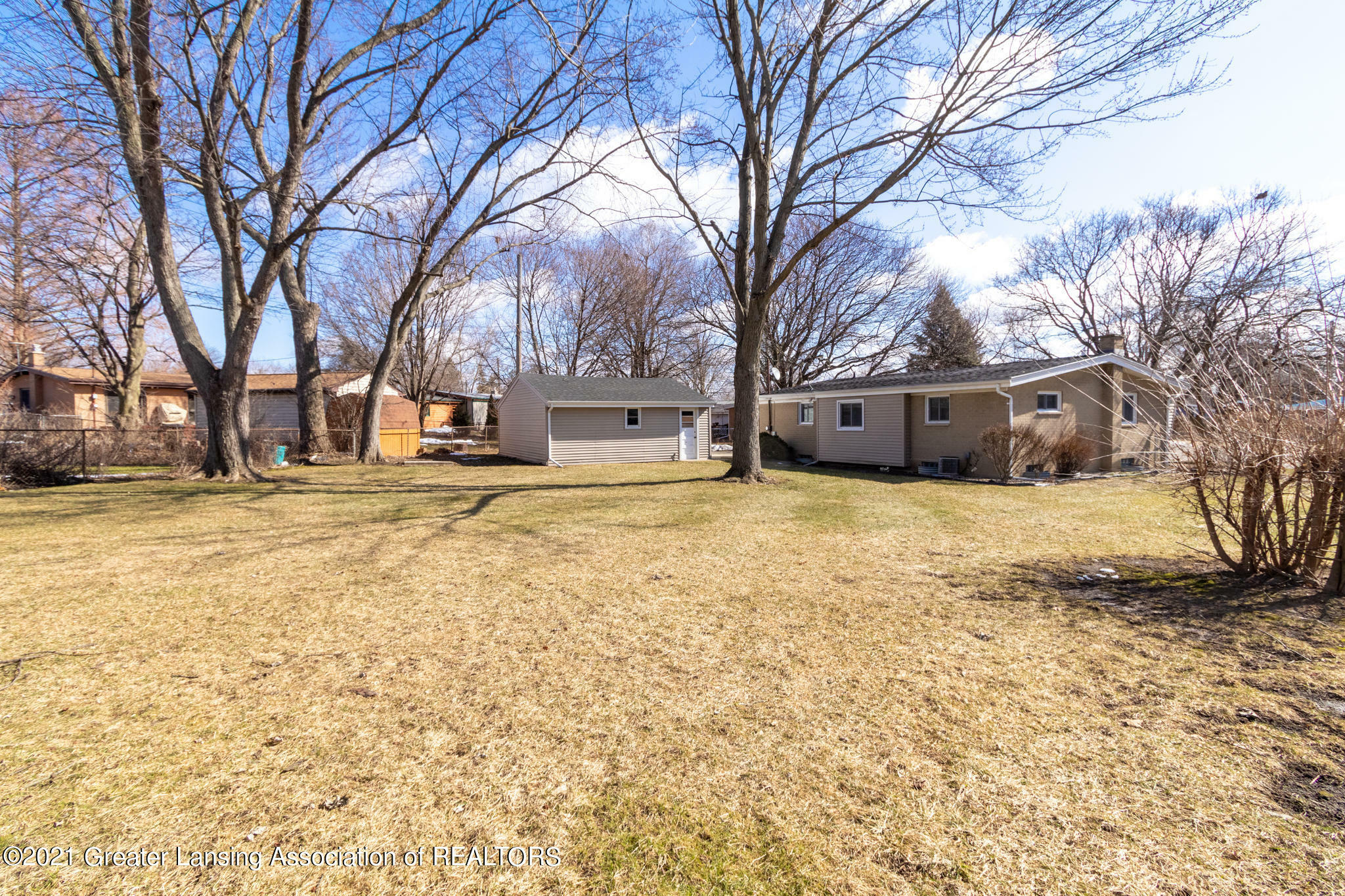 Property Photo:  1503 N Foster Avenue  MI 48912 