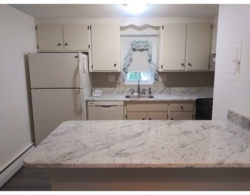 Property Photo:  100 Main Street 1-4  MA 02180 